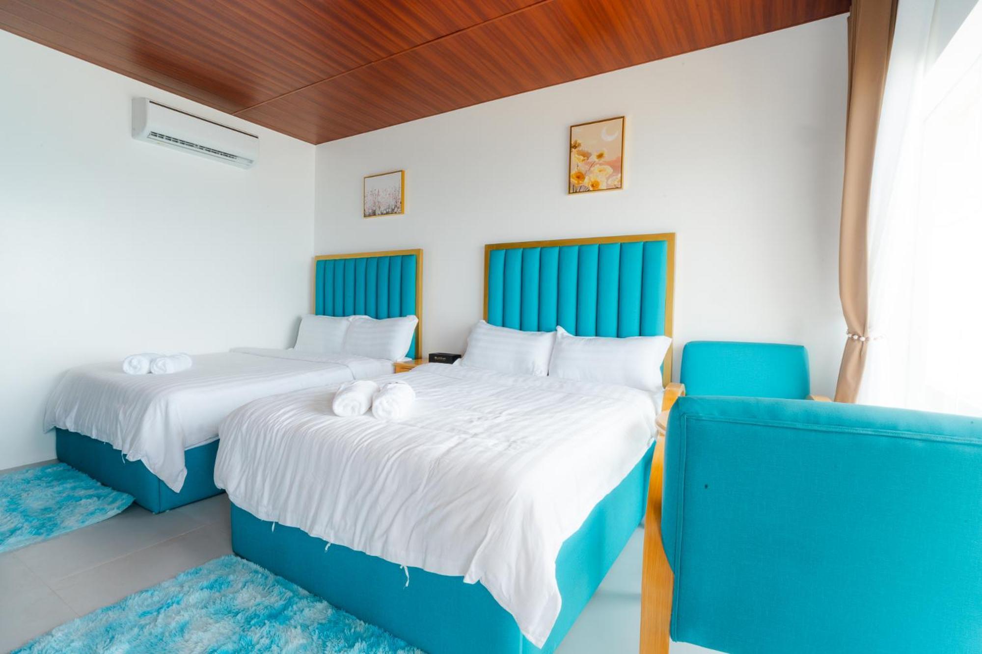 Q Beach Resort Cabangan Bagian luar foto