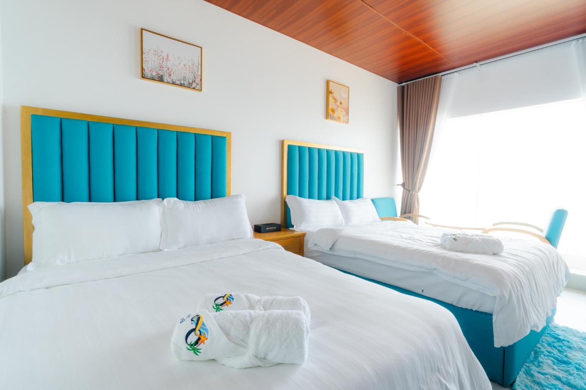 Q Beach Resort Cabangan Bagian luar foto