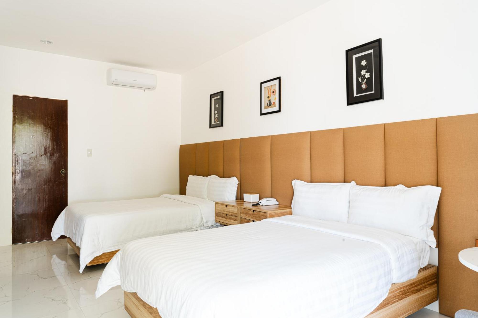 Q Beach Resort Cabangan Bagian luar foto