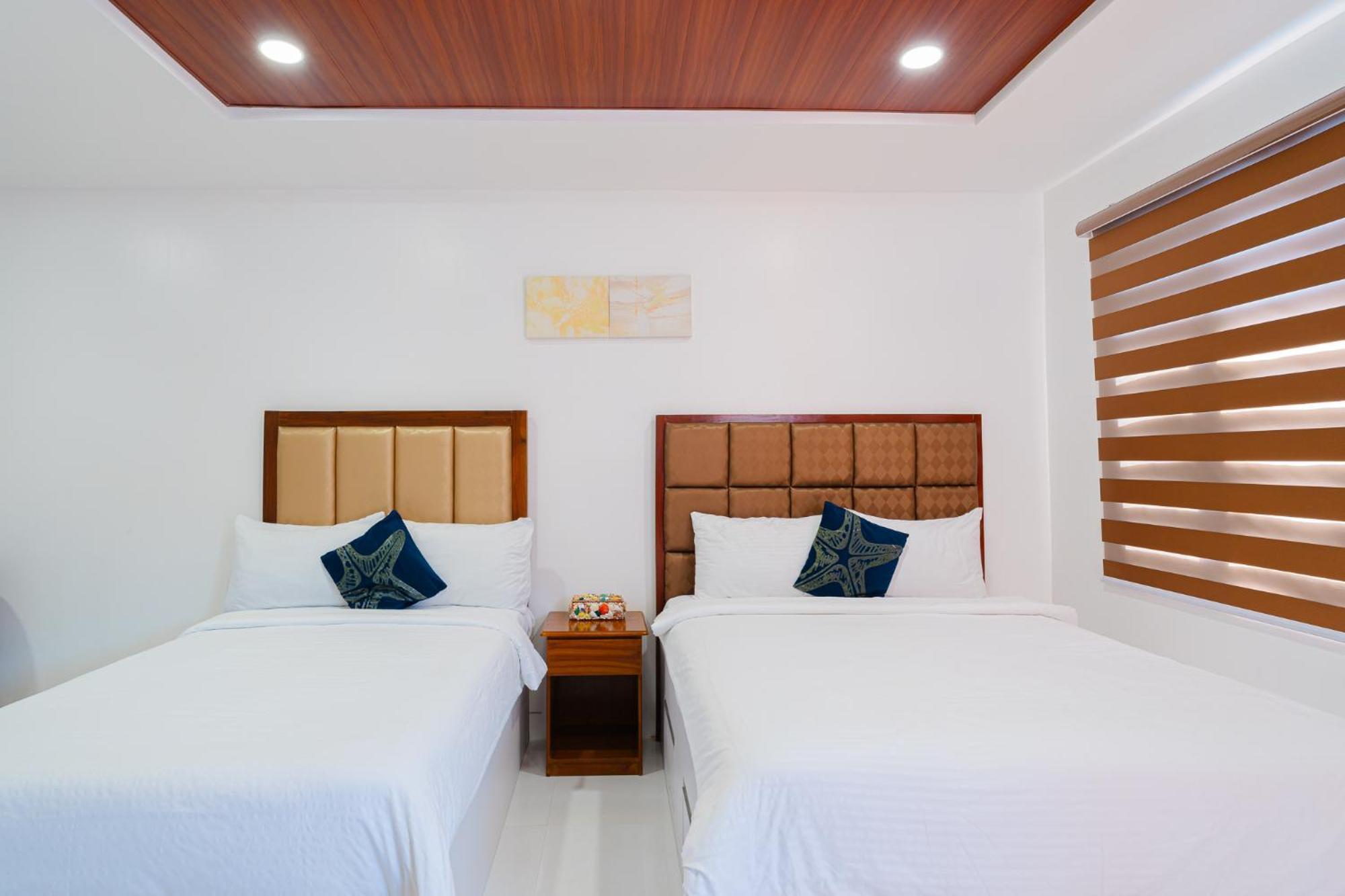 Q Beach Resort Cabangan Bagian luar foto