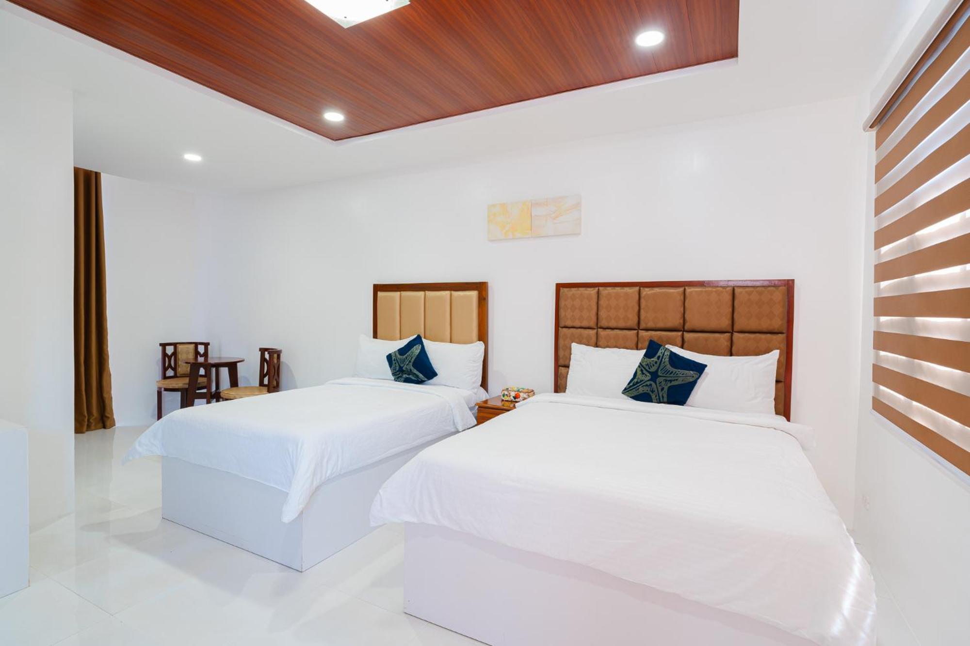 Q Beach Resort Cabangan Bagian luar foto