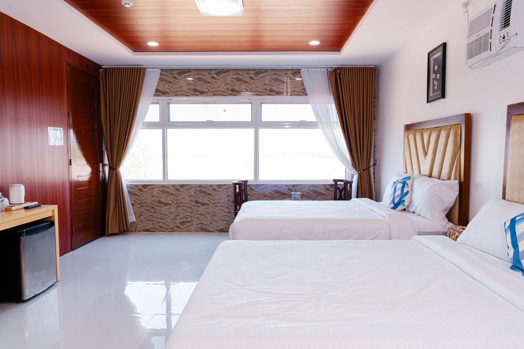 Q Beach Resort Cabangan Bagian luar foto