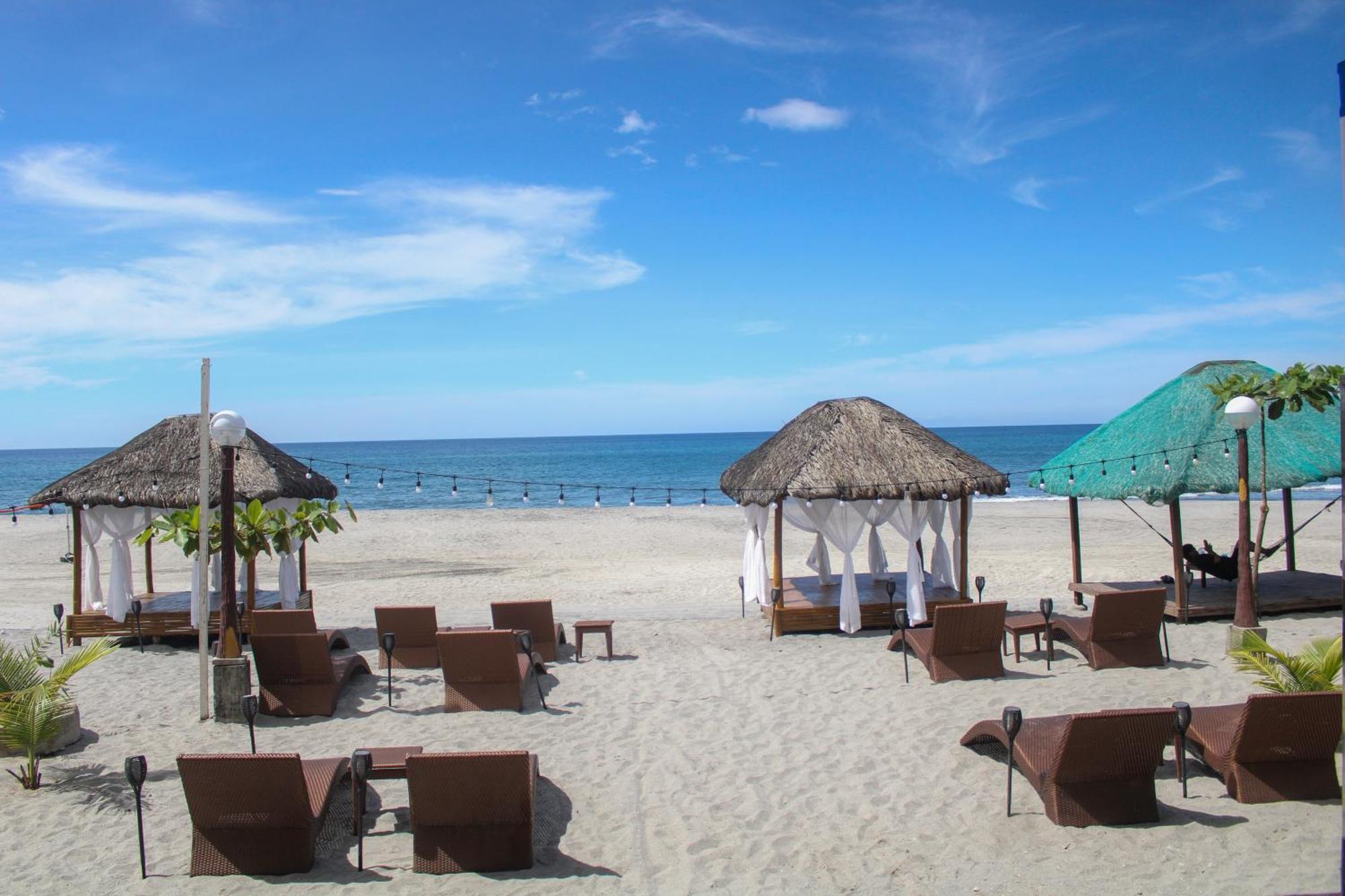 Q Beach Resort Cabangan Bagian luar foto